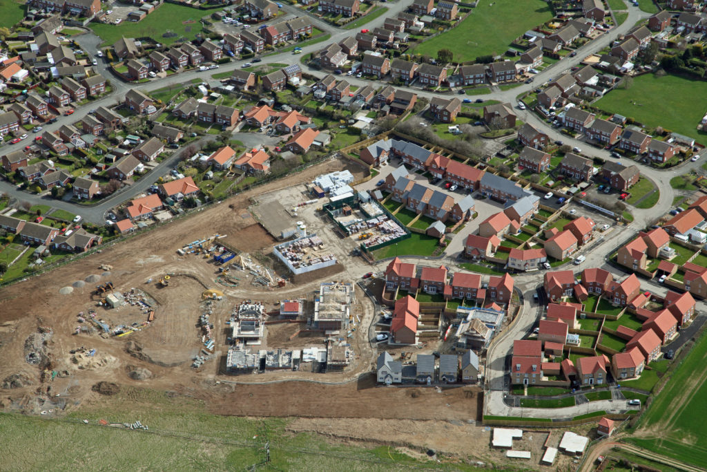 Aerial,View,Of,A,New,Housing,Development,Being,Built,In